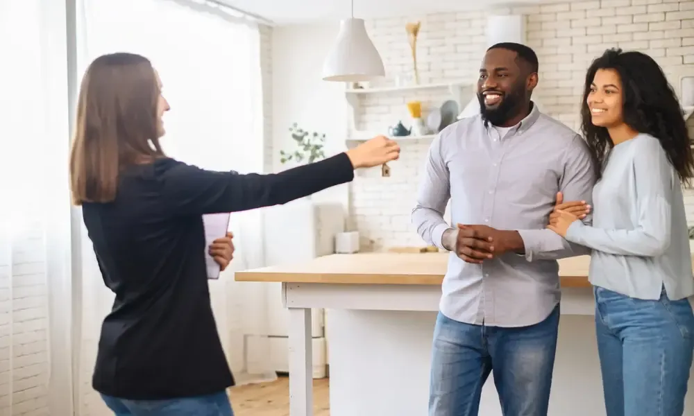 Clients receiving the keys to their new home